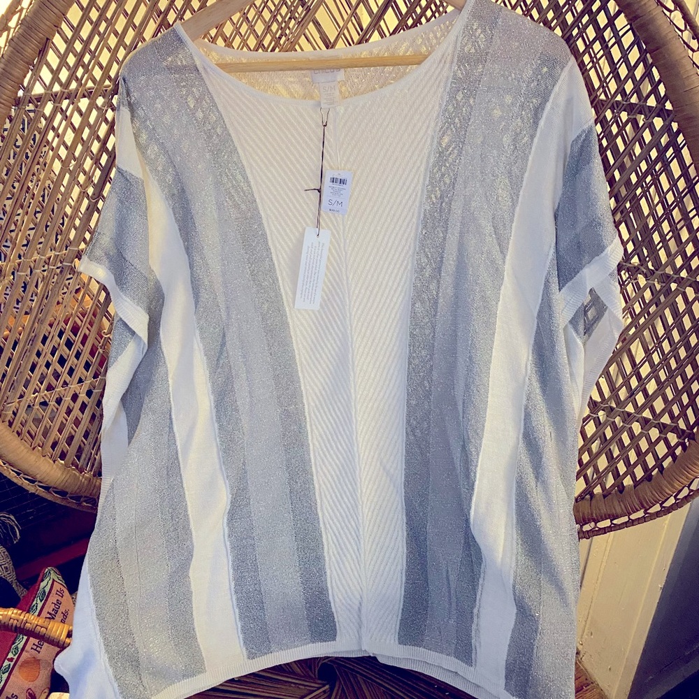 This sheer white/silver flowing top is super cute!
